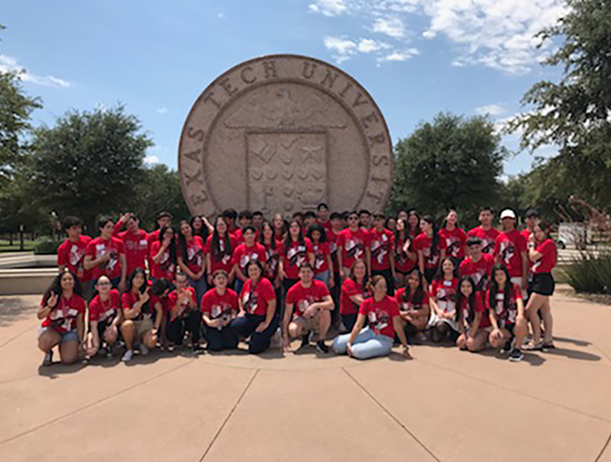 Summer campers in fromt of Texas Tech seal.