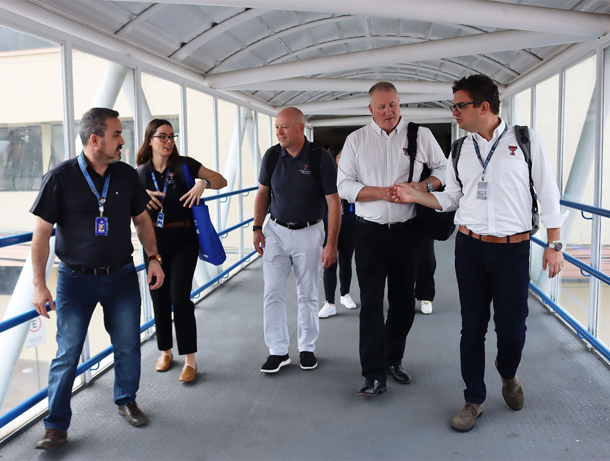 Scott Lucas and Jared Lay (center) arrive in Brazil.