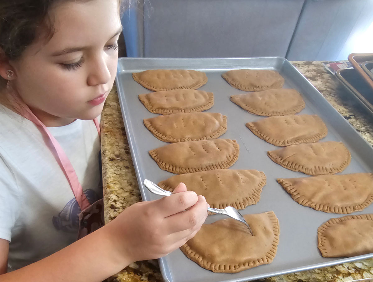 Sierra making empanadas.