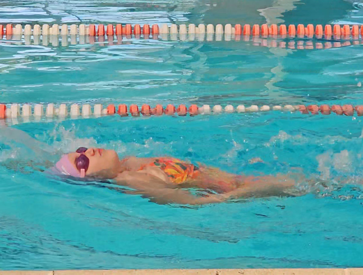 Sierra practices her swimming strokes, hoping to make a team at the YMCA.
