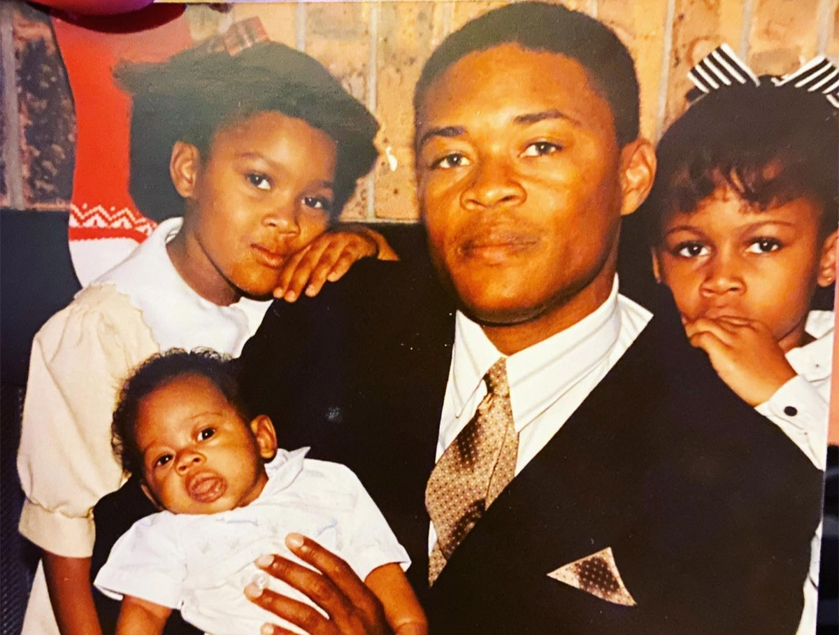 Gabrielle (right) with sister Bridgette, dad Roger and brother Bruce.jpeg Can use file title for caption.