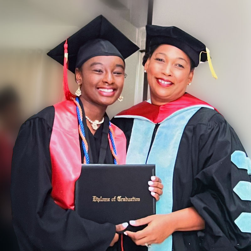 Principal Behrmann takes pride in her students' accomplishments after a trying few years in Haiti's capitol city. Principal Behrmann takes pride in her students' accomplishments after a trying few years in Haiti's capitol city.