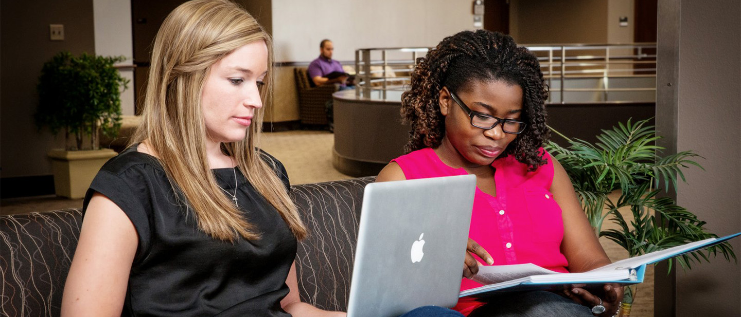 Students studying in the Texas Tech Law School Lanier Atrium.