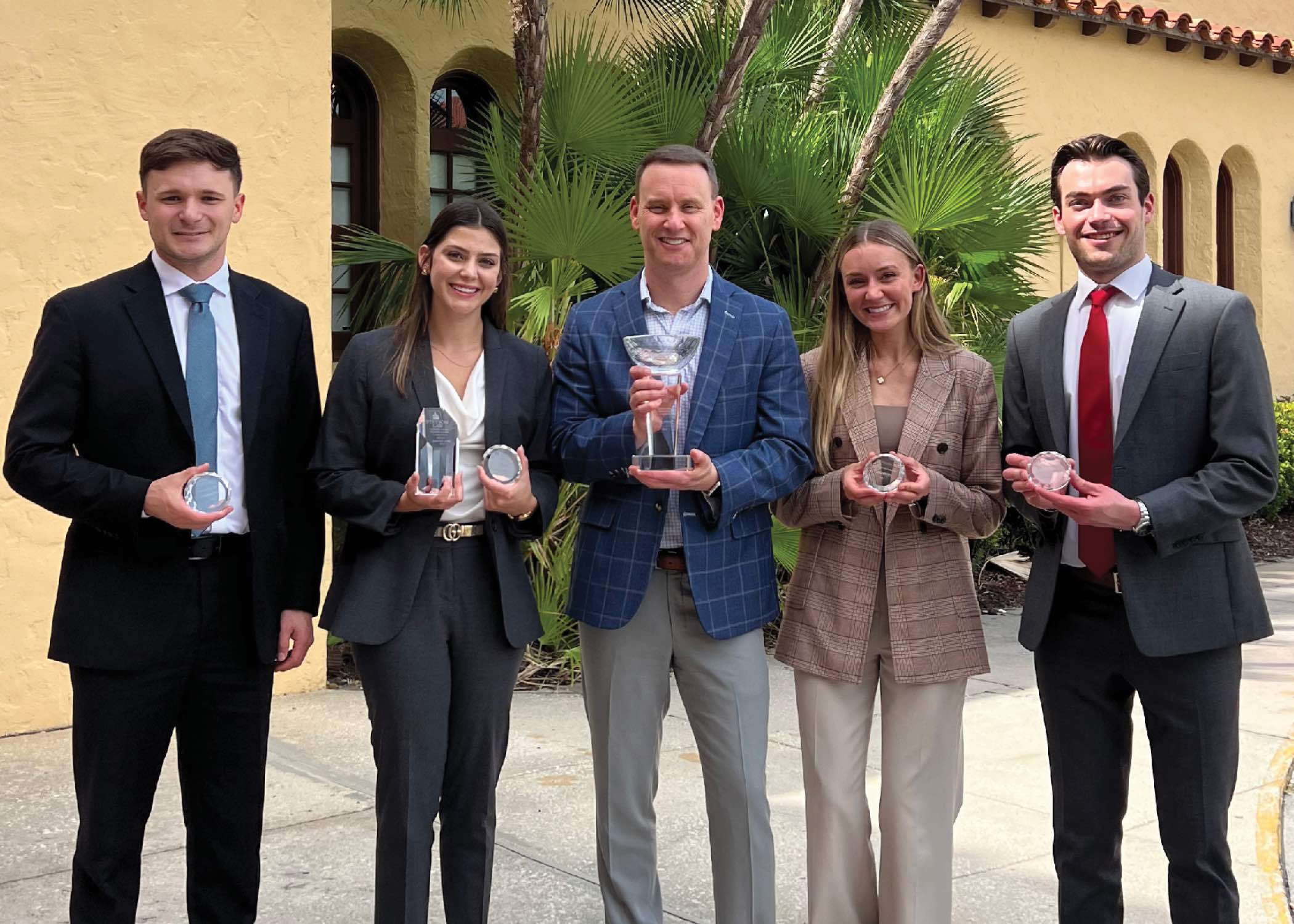Group photo of Rachel Behnke, Derek Fisher, Ryder Needham, Mabry Payne, and Professor Rob Sherwin.