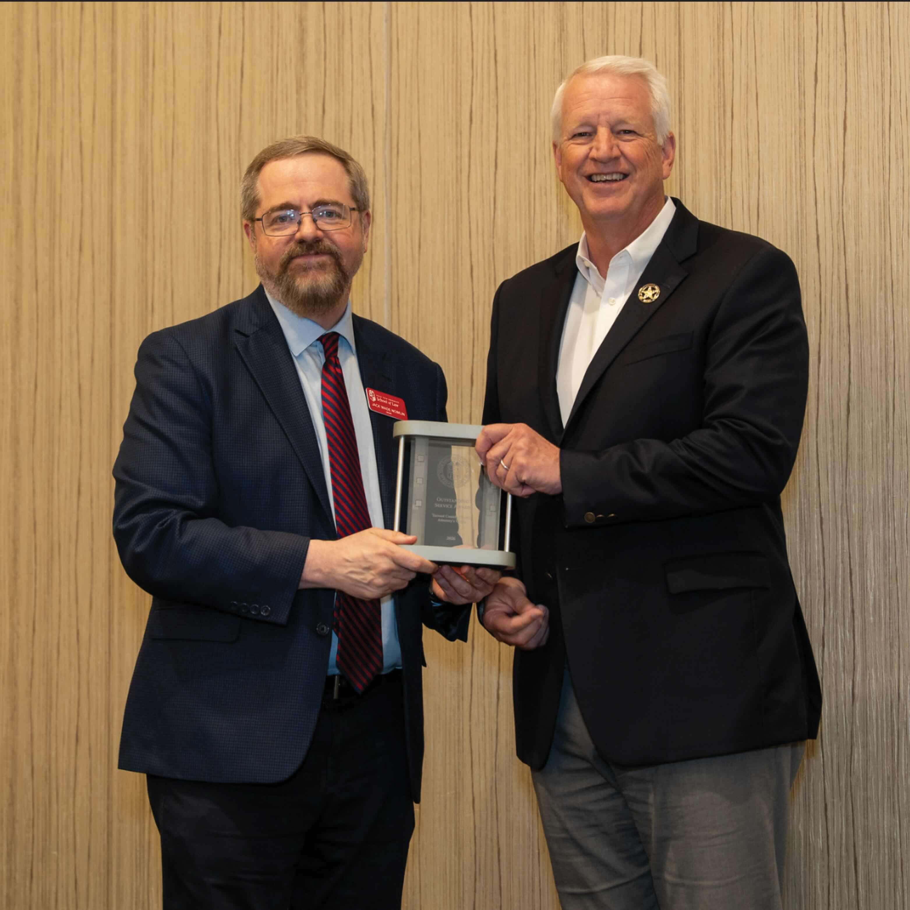 Outstanding Service Award was presented to the Tarrant County District Attorney's Office Outstanding Service Award was presented to the Tarrant County District Attorney's Office