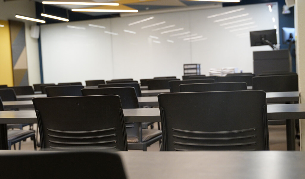 Professor teaching to students