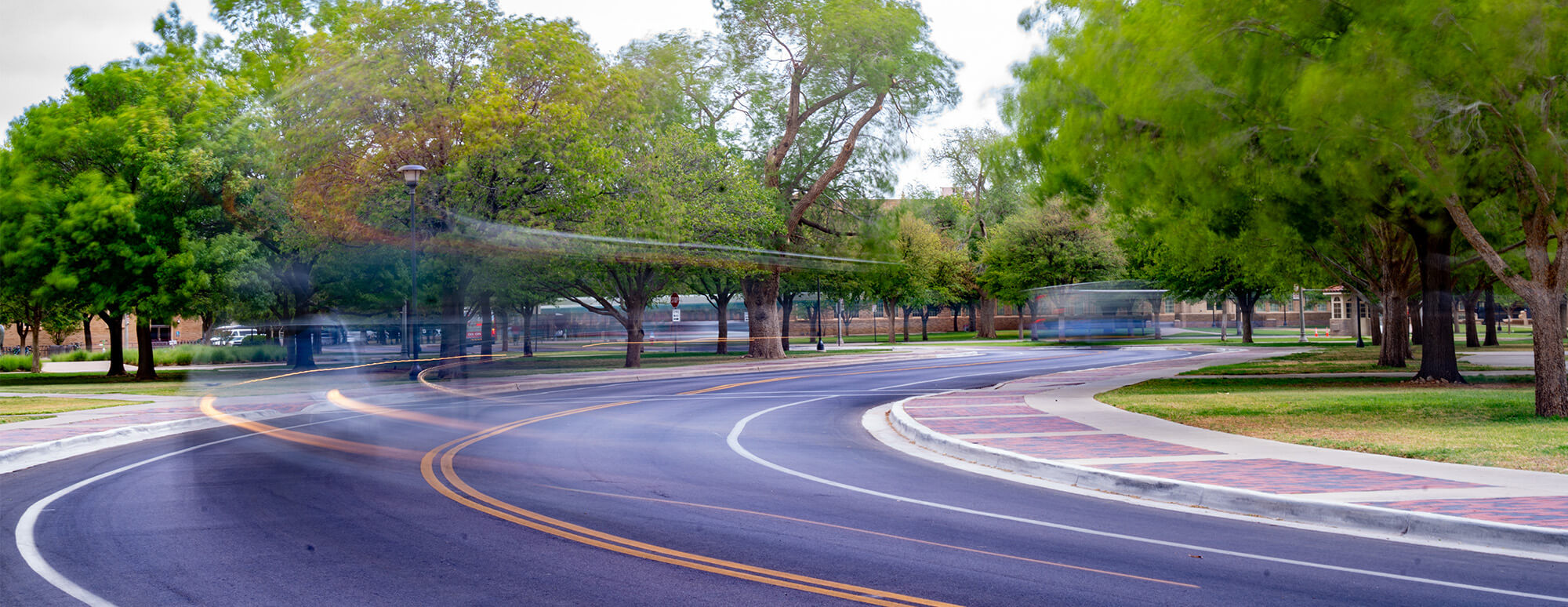 Cars that were captured blurry driving on Memorial Circle