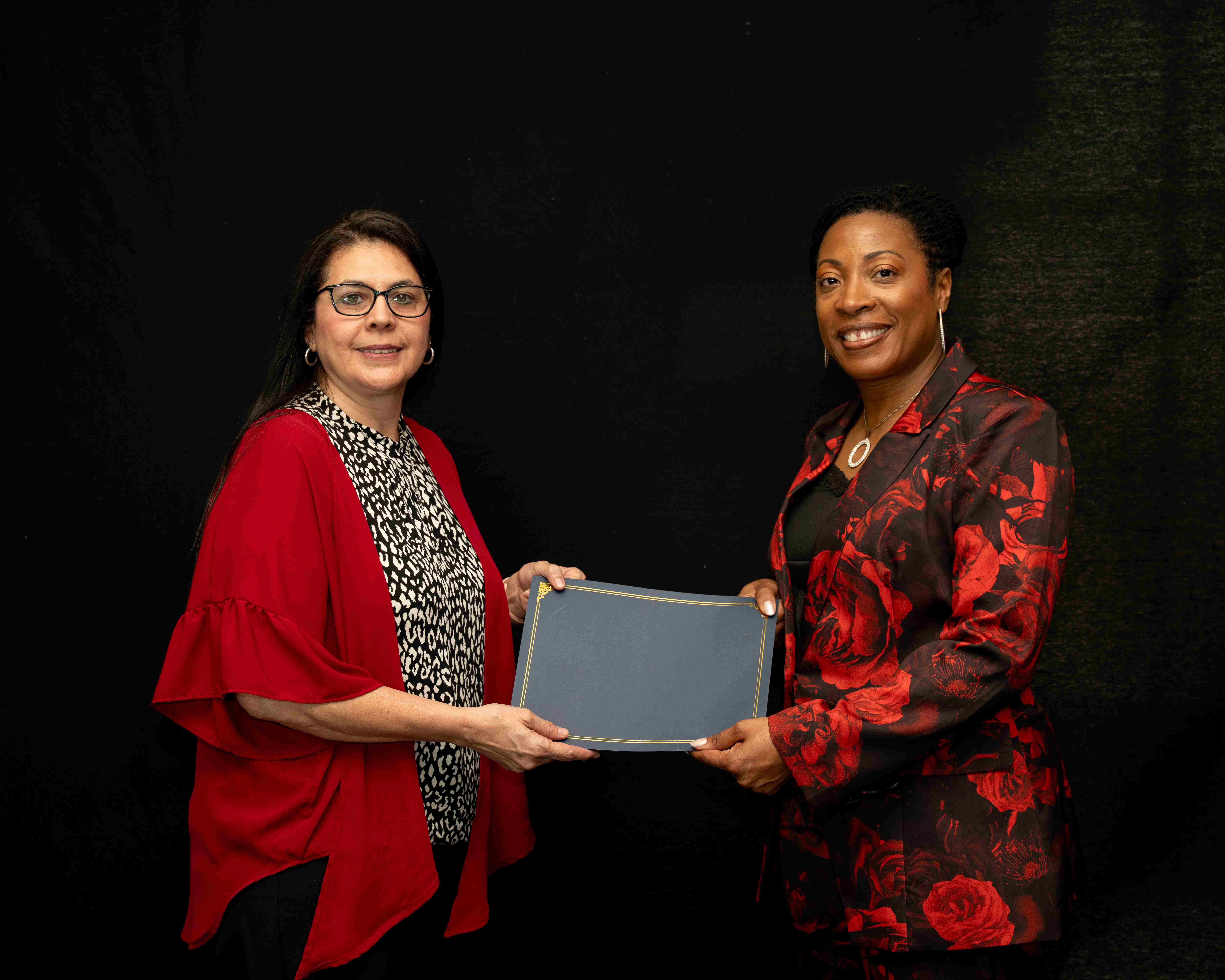 Maribel Breitweiser of Cavazos Middle School receiving the Helen I. Medley Award.