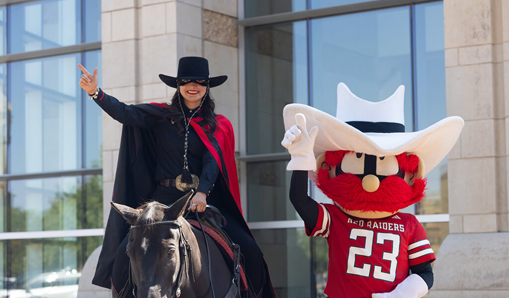 The Masked Rider and Raider Red standing in front of the SUB