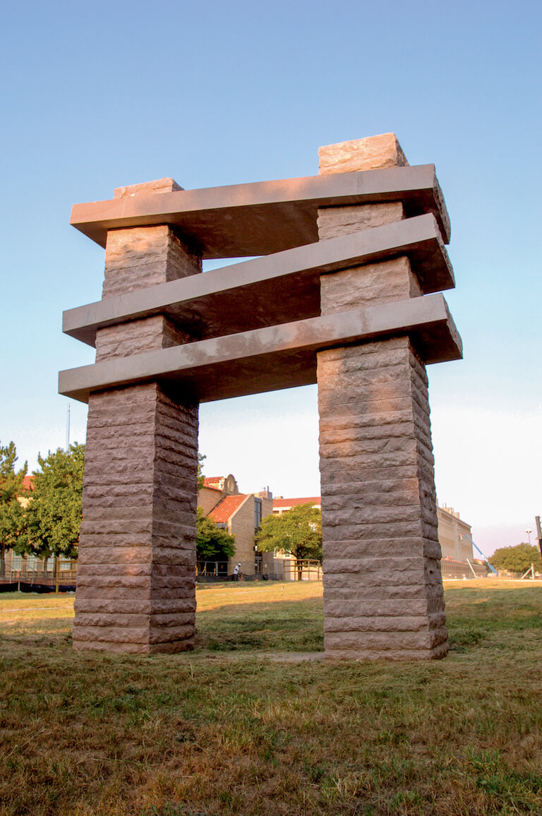 Photo of the setting sun on the Lapstrake art structure on the TTU campus