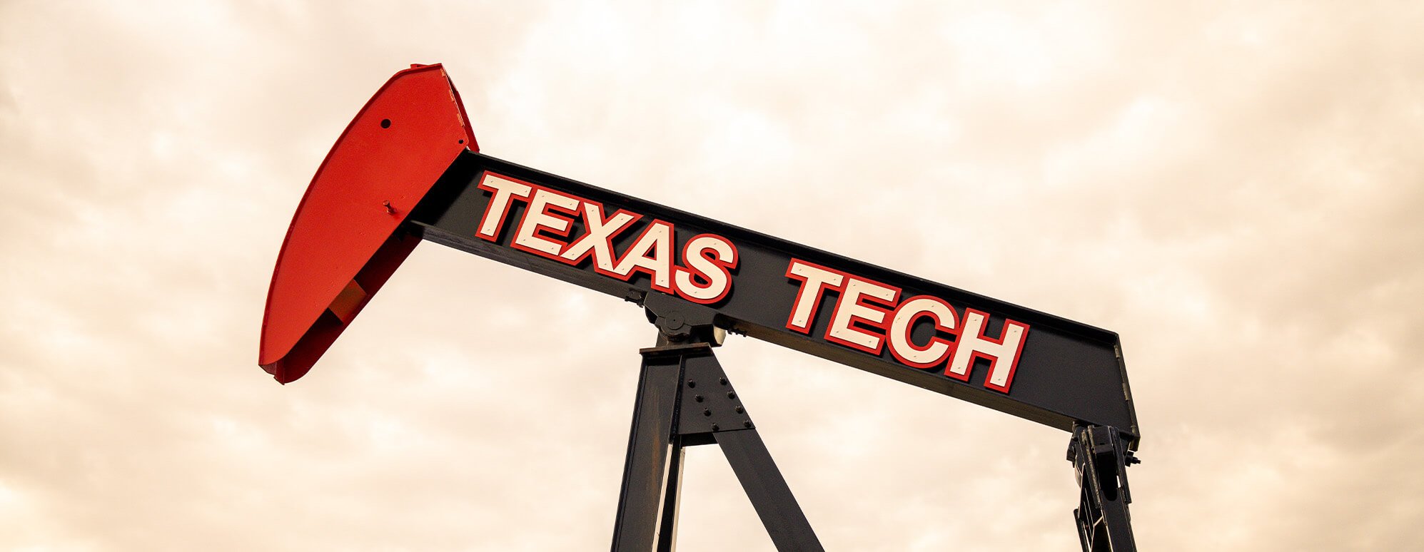 Texas Tech pump jack on the green space by ATT Stadium