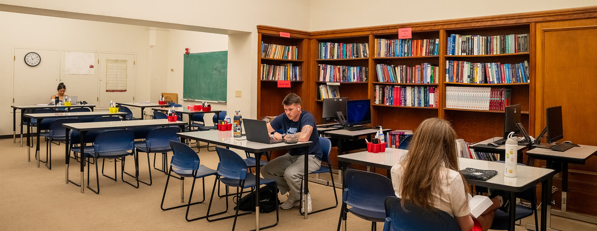 Students studying in the Tutor & Studying Center located in Room 106