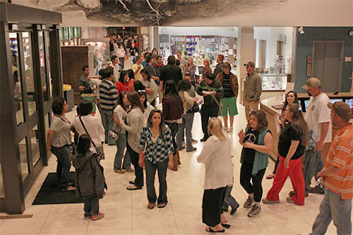 people in museum lobby