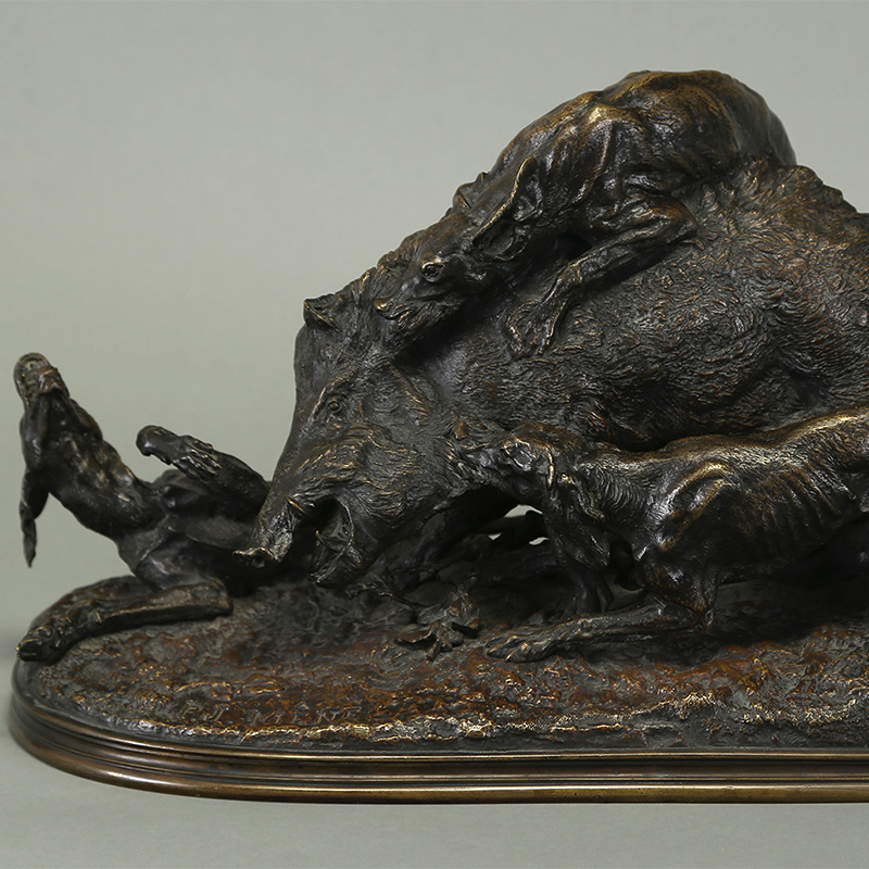 boar fighting with several dogs, cast in bronze