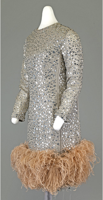 silver dress with feather bottom