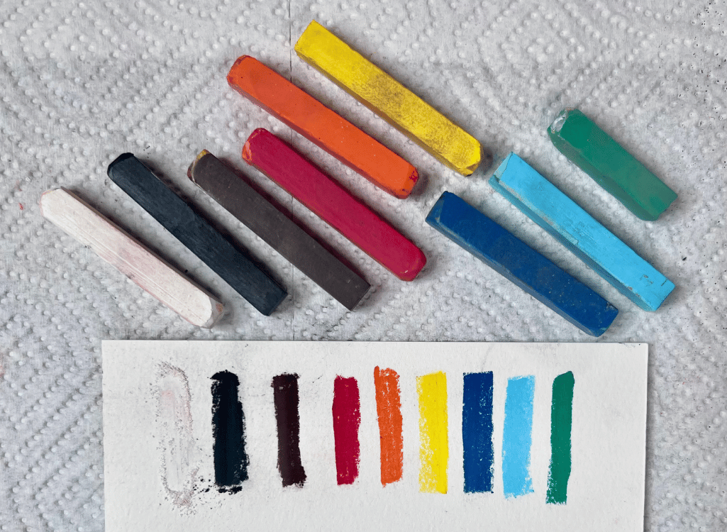 Multiple pastel colors laid out on paper towel Multiple pastel colors laid out on paper towel