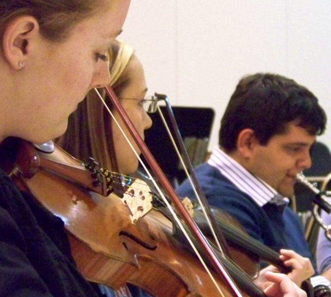 Close up of a student playing violin