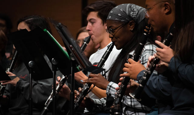 Group of students playing clarinet