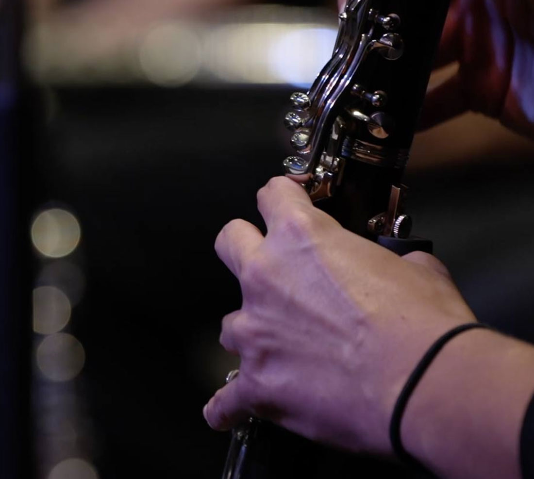 Close-up of student playing clarinet