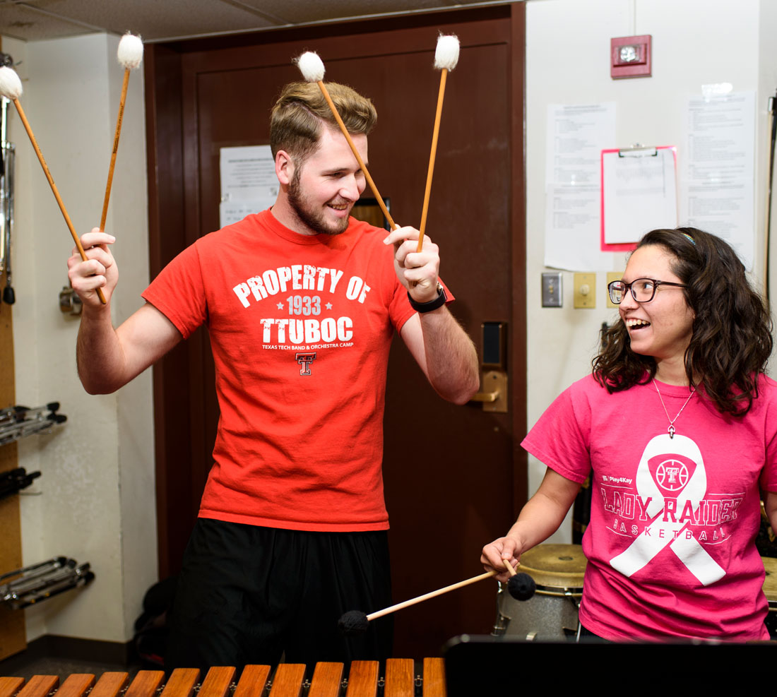 Instructor and student on xylophone