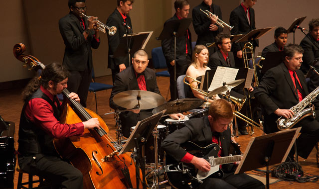 Students playing in a jazz group onstage