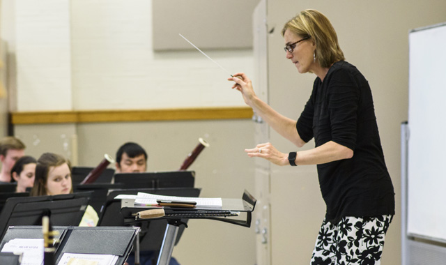 TTU Music Faculty conductor Sara McKoin with winds 