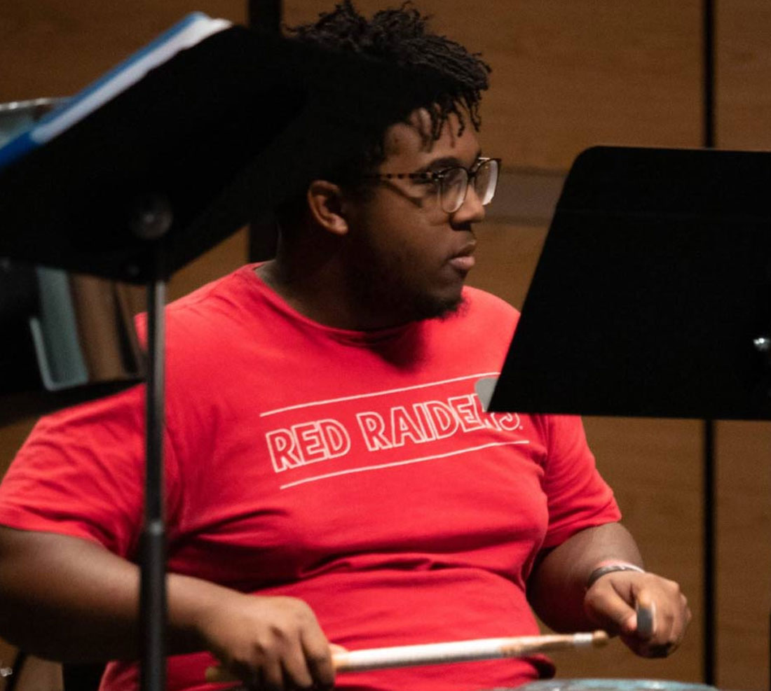 Student playing drums