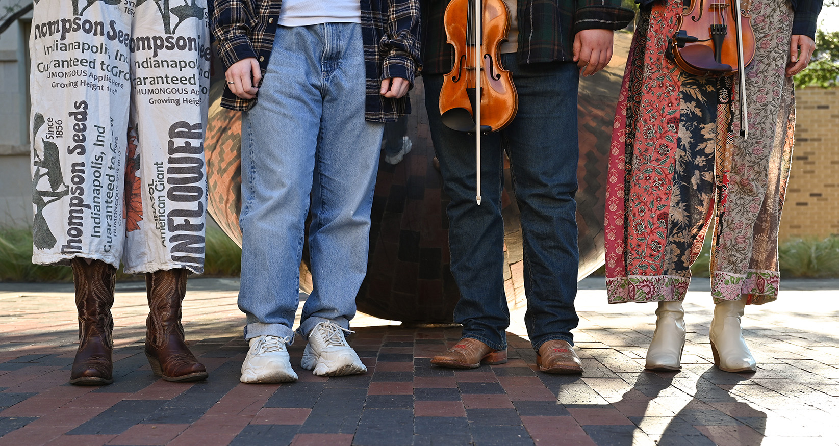 Just the feet in shoes of the TTU Vernaculat Tech Folk Fiddlers