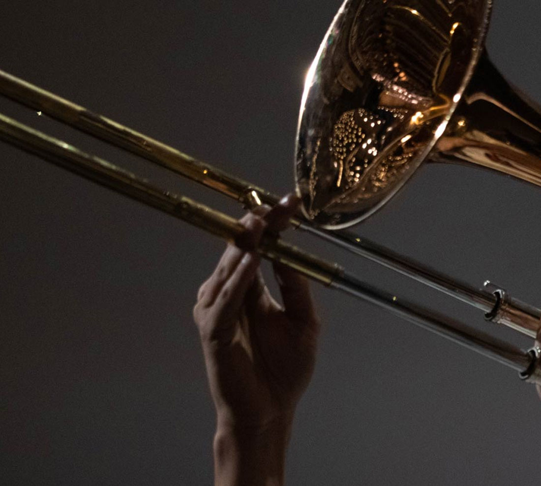 Close-up of student playing trombone