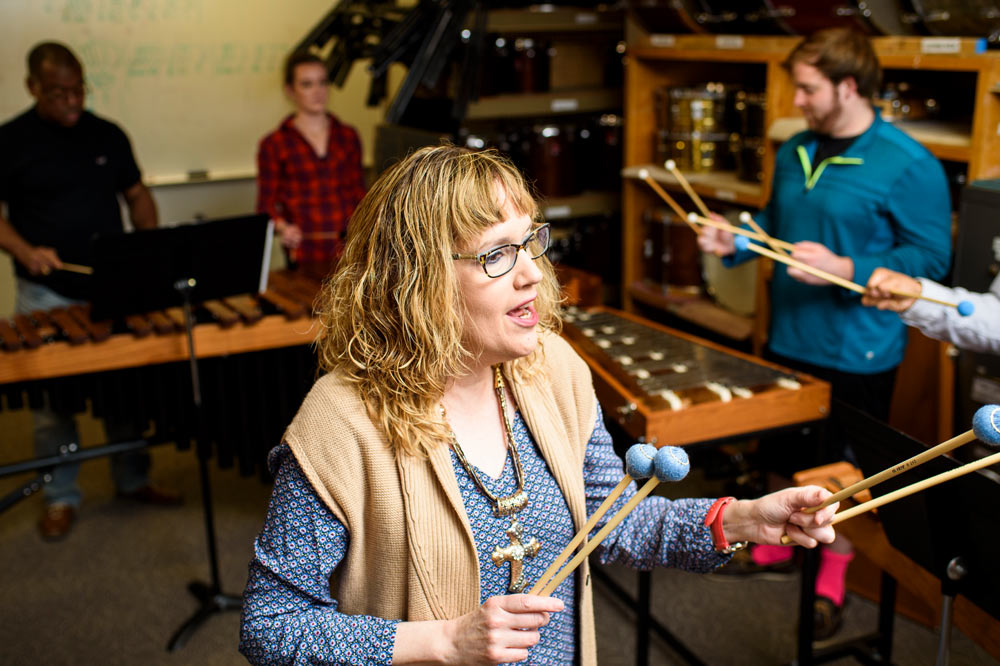 TTU faculty & student in front of xylophone