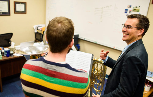 Student & faculty practicing the baritone
