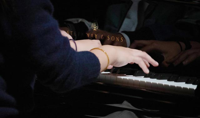 TTU student playing piano