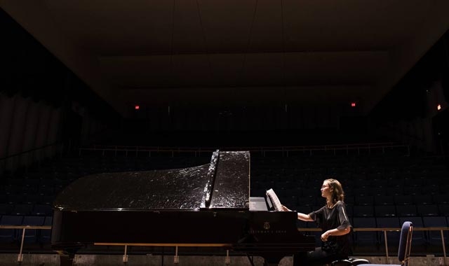 Piano student performing onstage