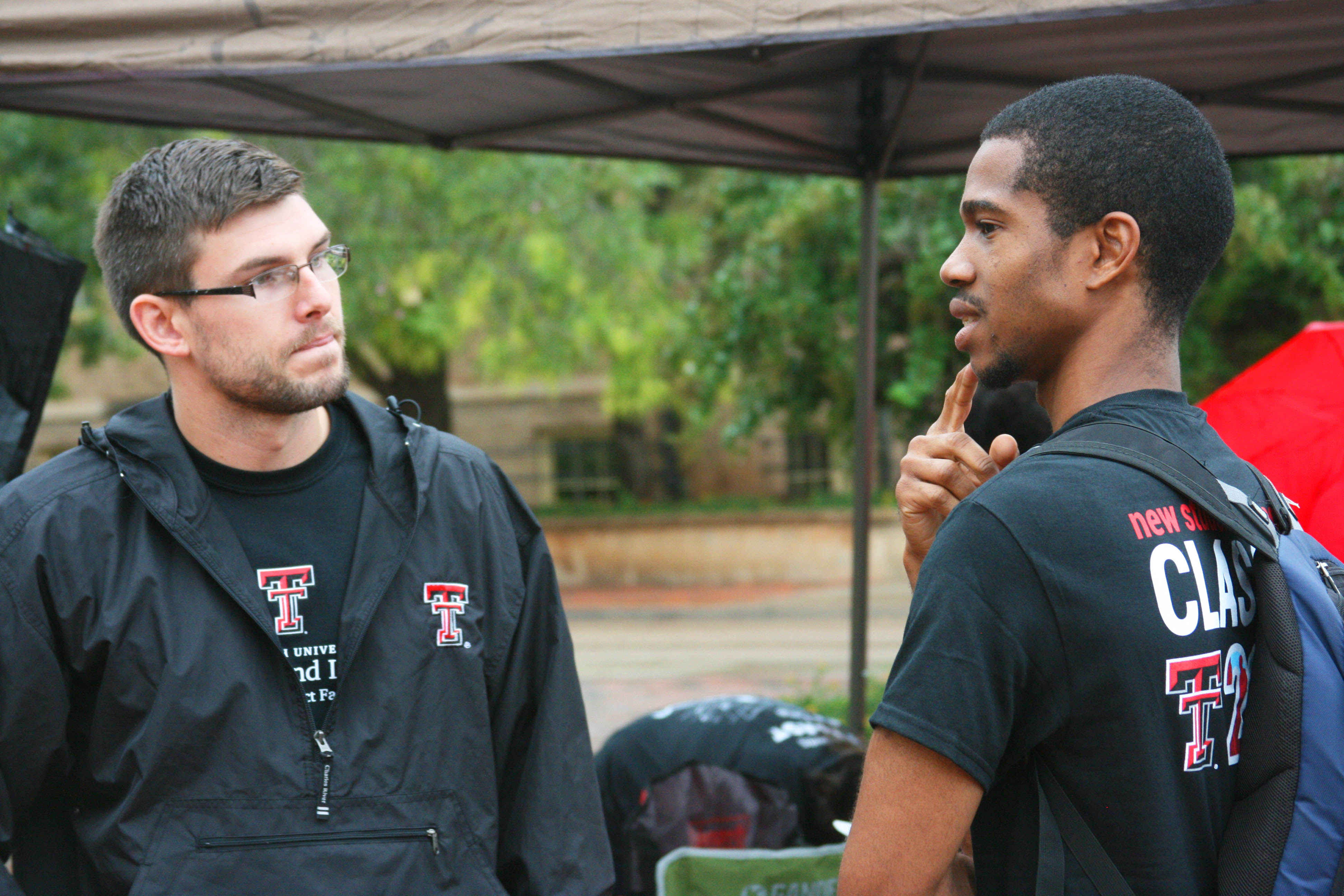 NWI Ph.D. student Rich Krupar III chats with a potential student about the program.