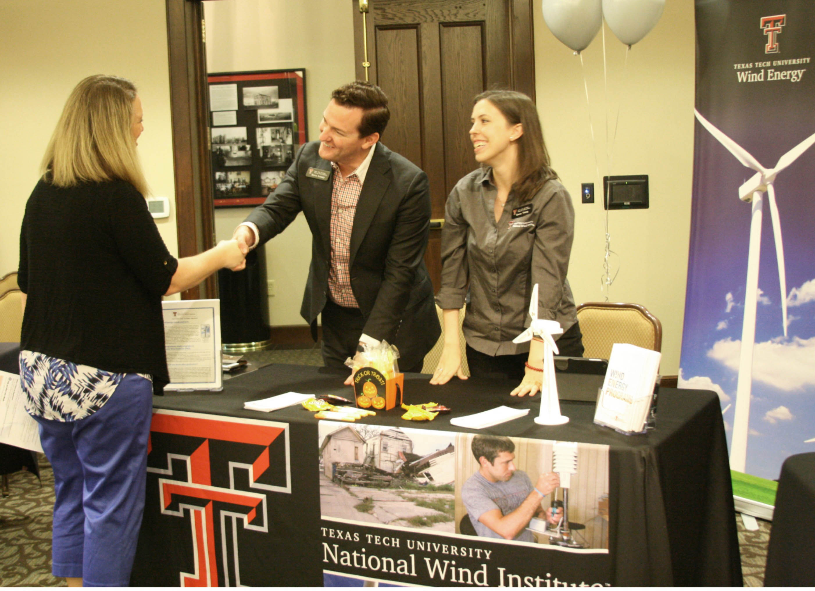 NWI staff welcome students to their informational booth at the TTU Major and Minor Fair