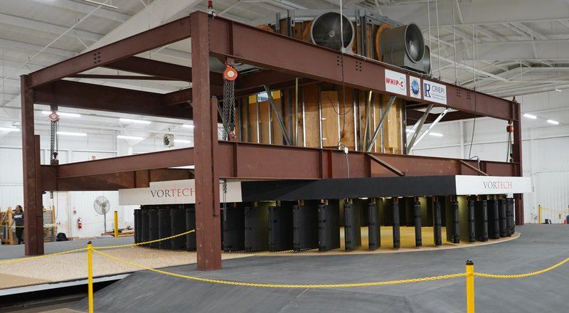 The VorTECH tornado simulator with a full-scale test specimen inside the steel test frame