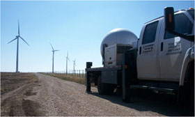 A TTUKa research radar deployed in a wind farm collecting data.