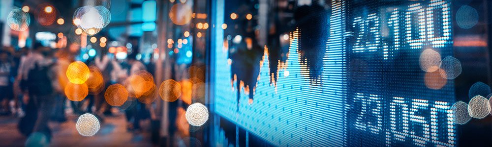  electronic display of stocks in busy city street