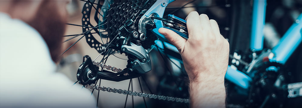 close up of bicycle being worked on