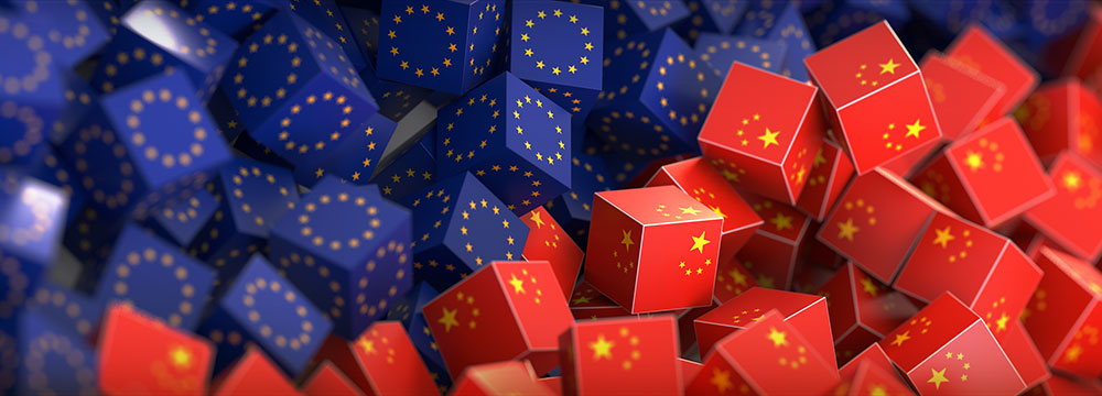 pile of cubes with the European Union flag on the top left, and the  National flag of the People's Republic of China on the bottom right