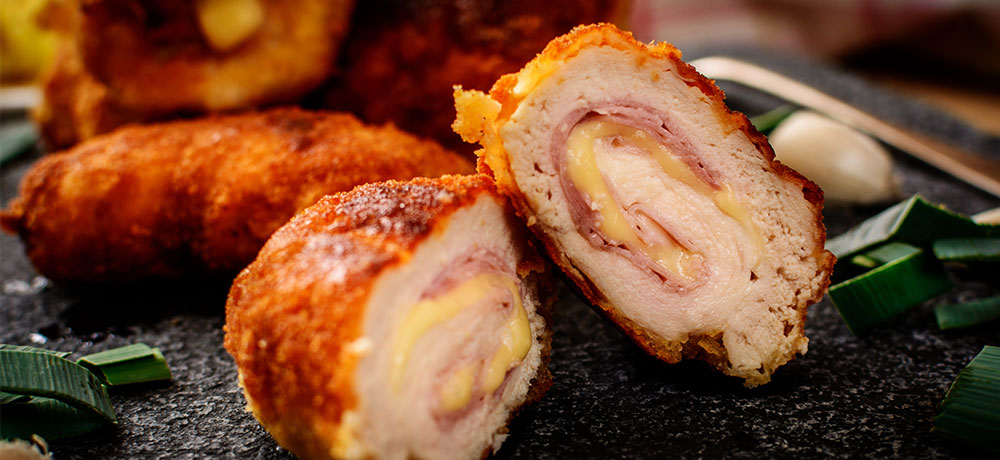 Chicken cordon bleu with cheese and ham.