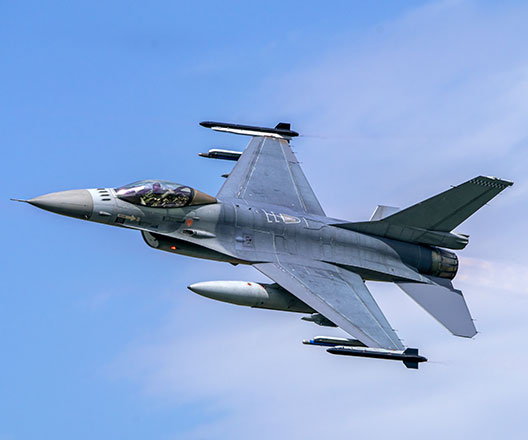 F16 fighter jet in flight.