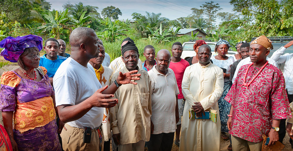 Sixtus Atabong with village leaders at the opening of a clinic in Munyenge.