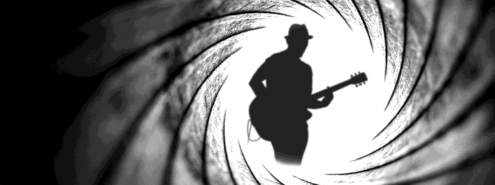 Silhouette of guitar player viewed through the barrel of a gun.