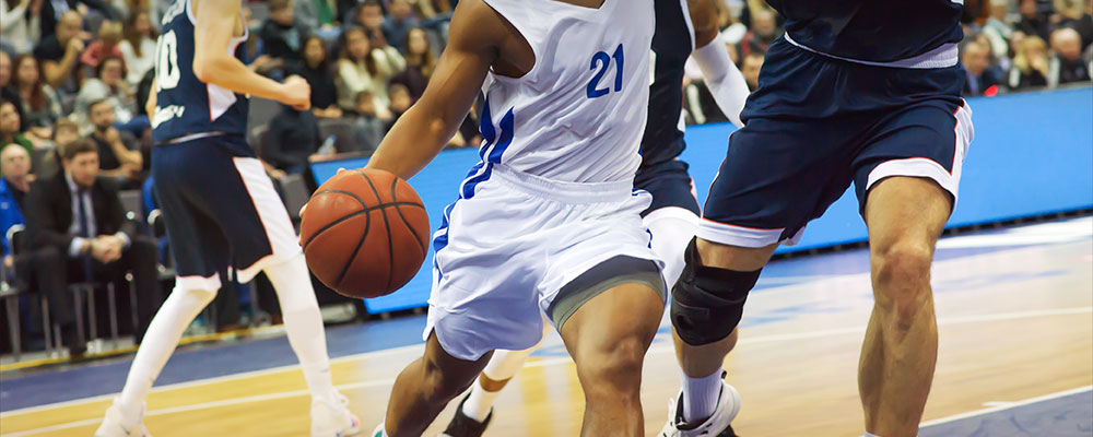 College basketball players on the court
