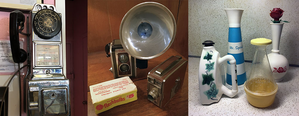 Collage of a payphone, old cameras and a flashbulb on a table, and assortment of vintage water sprinklers.