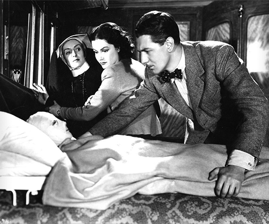 Promotional still from the 1938 film The Lady Vanishes, published in National Board of Review Magazine