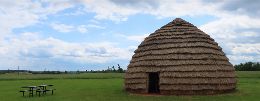 Traditional grass house at Caddo Mounds State Historic Site, constructed 2022 in collaboration with Caddo Nation.