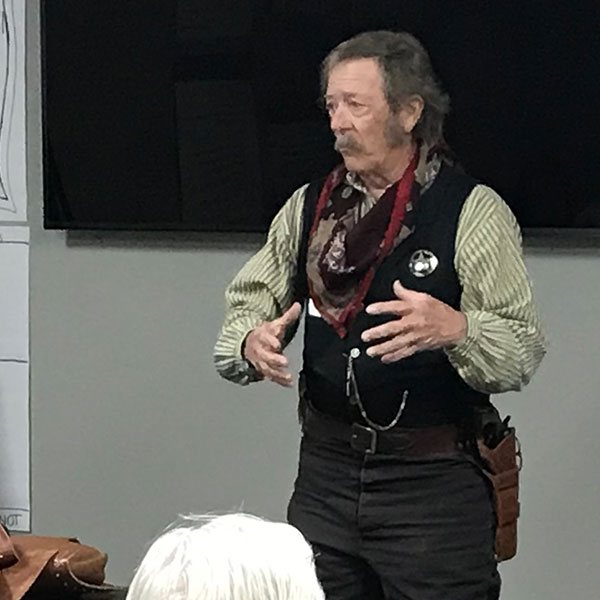 Instructor dressed as a 19th Century Texas Ranger explaining their history from 1823-1848.