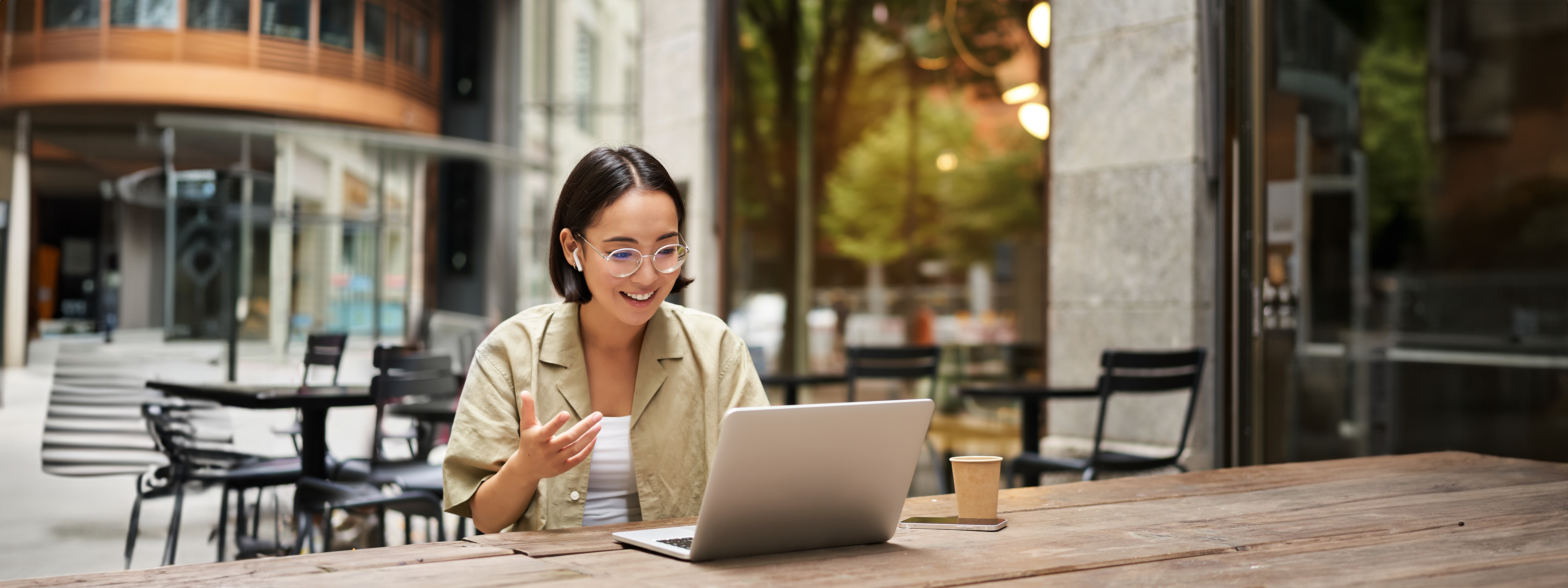 Person outside with laptop